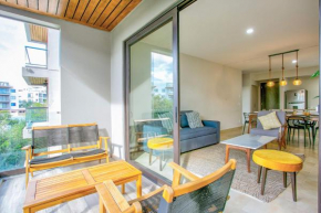 Luxe Condo with Private Terrace Overlooking Kayaking Canal